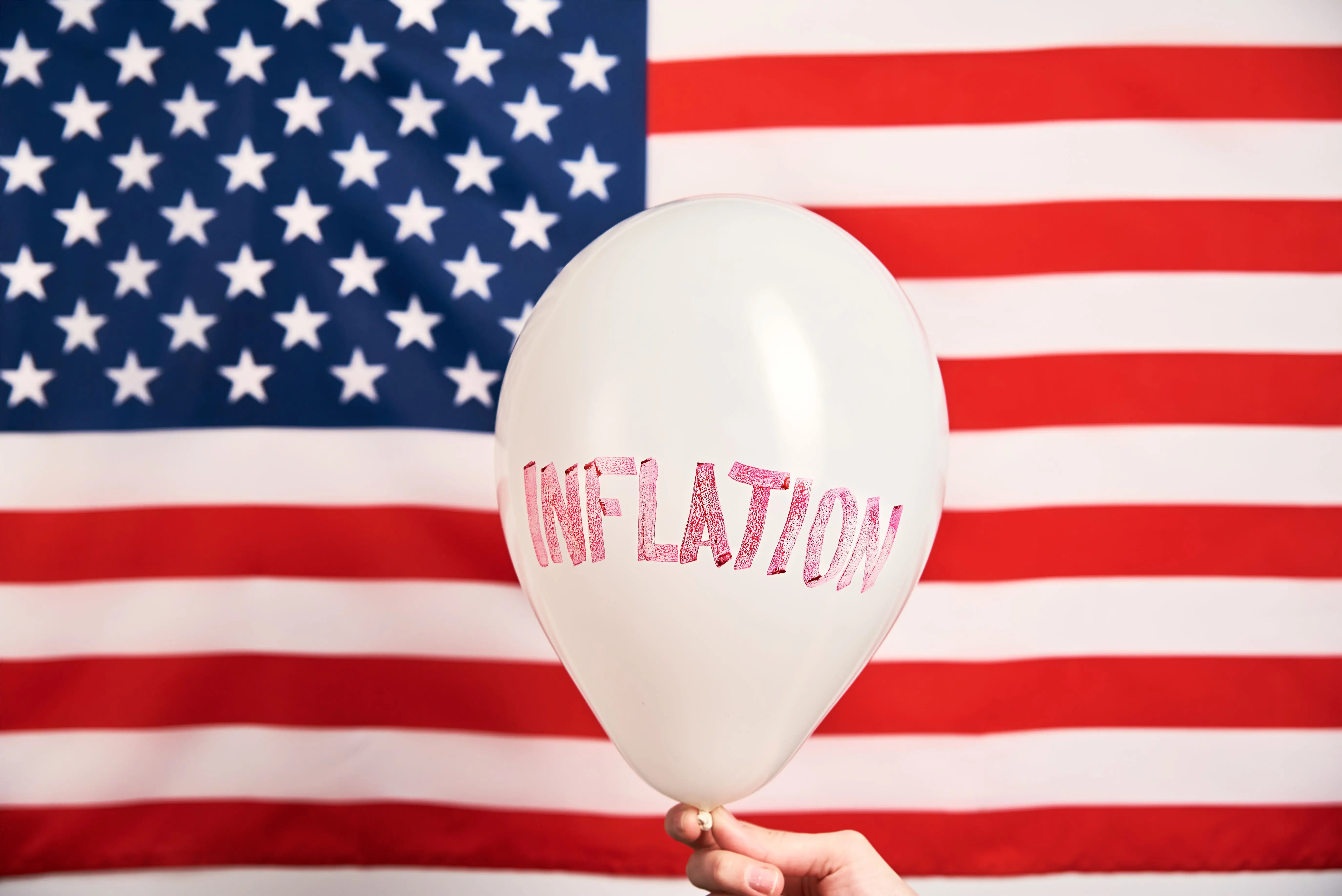 world-inflation-concept-balloon-with-word-inflati-2023-11-27-05-15-40-utc